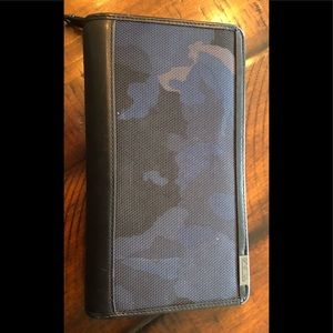 Men’s Tumi zip around wallet